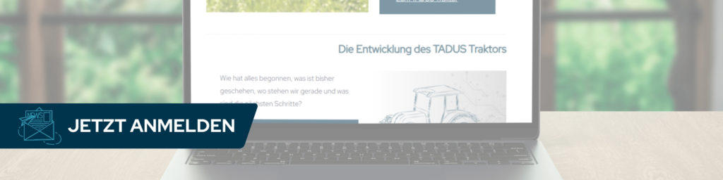 Zu sehen ist ein aufgeklappter Laptop mit der Webseite von TADUS GmbH.